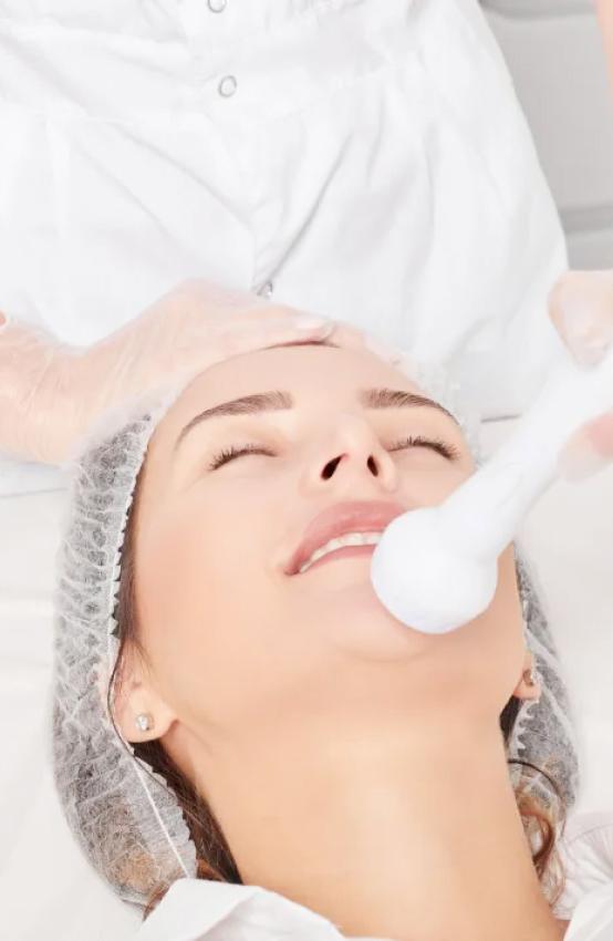 Facial rejuvenation treatment at a dermatology clinic to improve skin texture and promote a youthful glow.