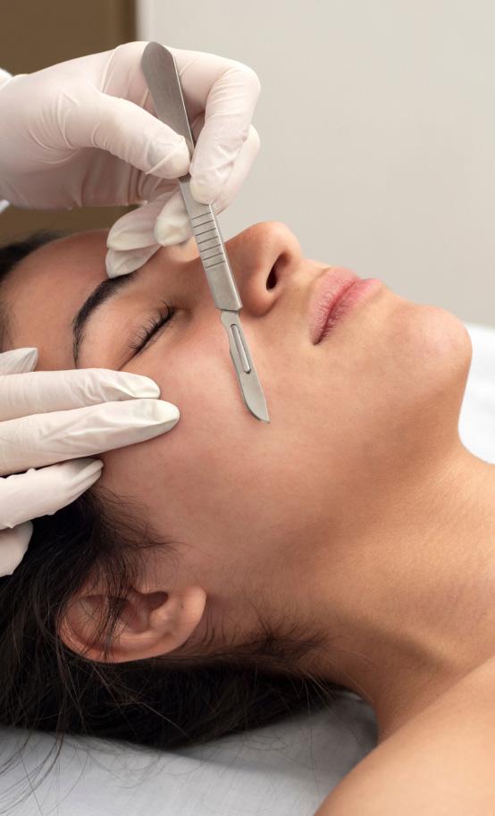 Dermaplaning treatment at a dermatology clinic for exfoliation and smooth, radiant skin.