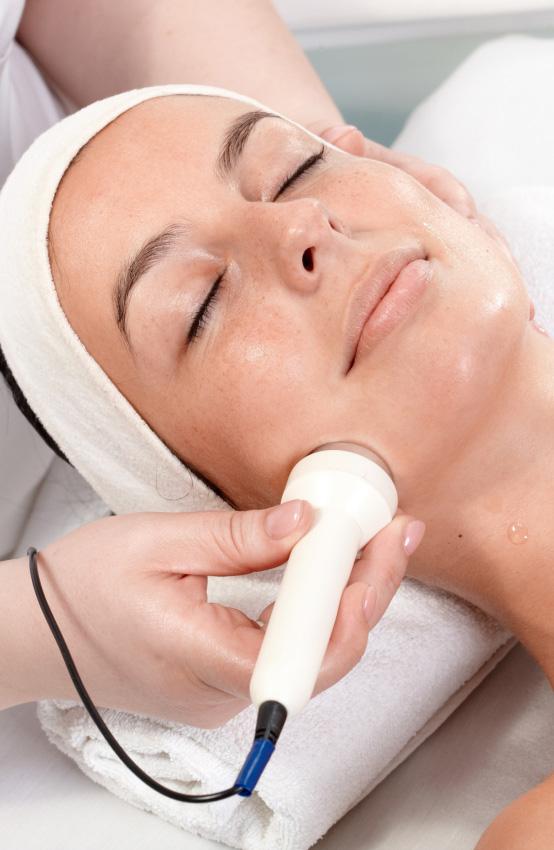 Radiofrequency facial treatment at dermatology clinic for skin tightening, collagen boost, and anti-aging benefits.