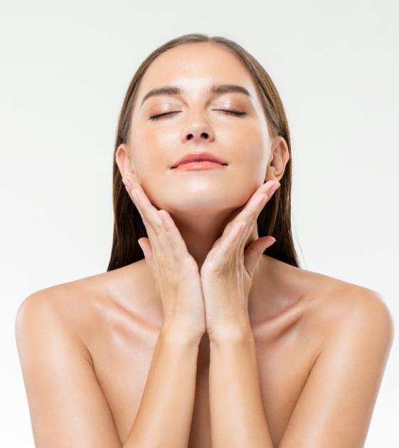 woman with radiant skin after dermatology facial treatment for hydration and skin rejuvenation