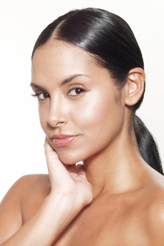 woman with radiant skin after dermatology facial treatment for hydration and skin rejuvenation