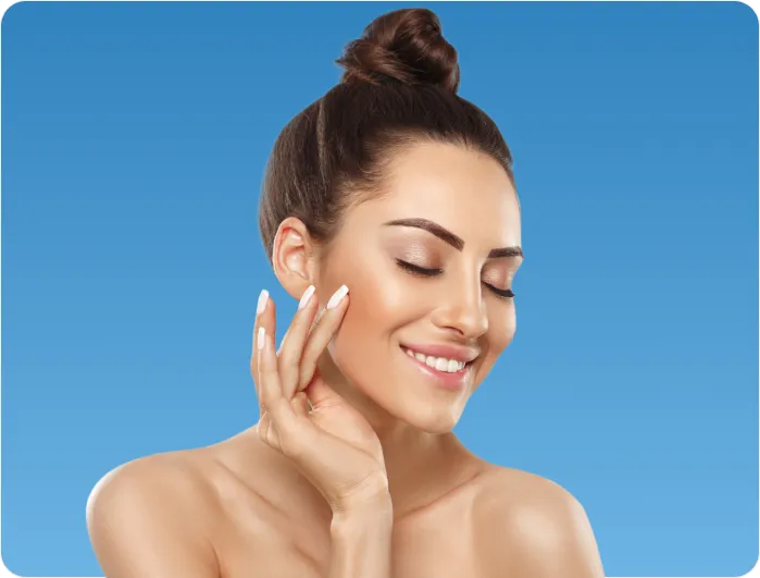 Woman with radiant, healthy skin after dermatology treatment for a glowing and youthful complexion.