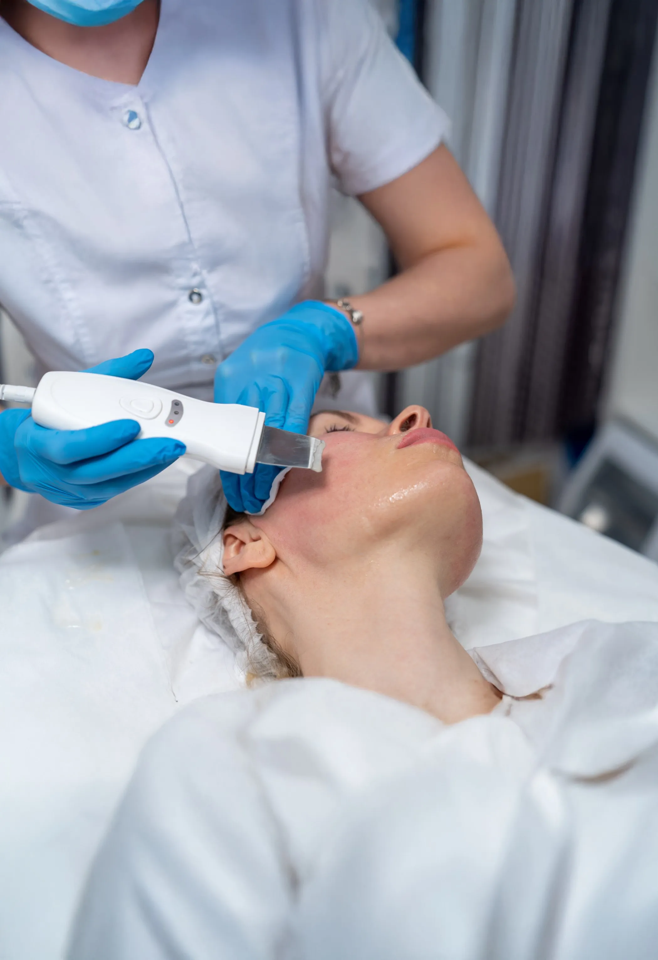 ultrasonic facial treatment at dermatology clinic for deep cleansing and skin rejuvenation