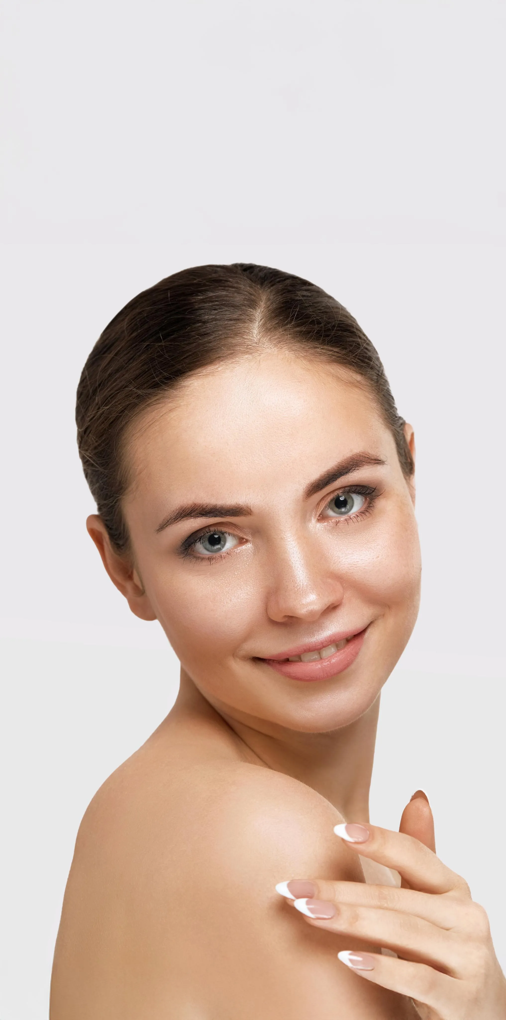woman with smooth, radiant skin after dermatology facial treatment for hydration and rejuvenation