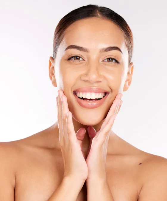 woman with radiant skin after dermatology facial treatment for hydration and skin rejuvenation