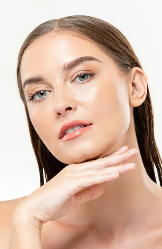 woman with radiant skin after dermatology facial treatment for hydration and skin rejuvenation