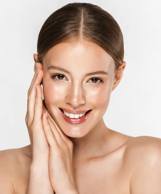 woman with radiant skin after dermatology facial treatment for hydration and skin rejuvenation