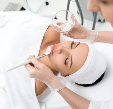 Chemical peel treatment at dermatology clinic for skin rejuvenation and acne reduction